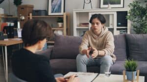 teen talking to therapist about adhd